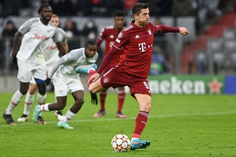 Lewandowski scored two penalties as Bayern cruised into the Champions League quarter-finals. AFP