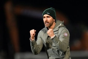 Hollywood actors Ryan Reynolds and Rob McElhenney celebrated in the stands as Wrexham moved closer to promotion from the National League in dramatic fashion on Saturday.
