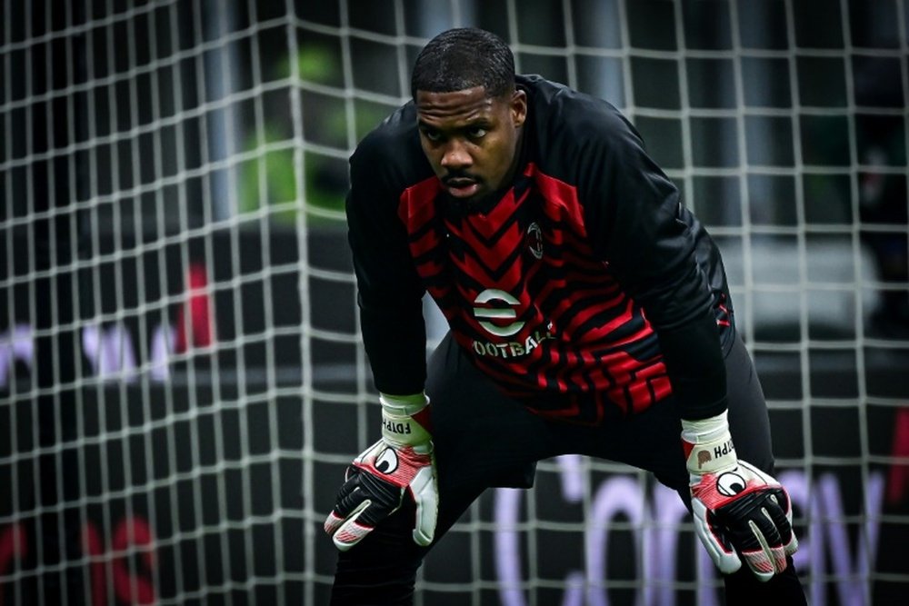 Mike Maignan was racially abused by Udinese fans. AFP