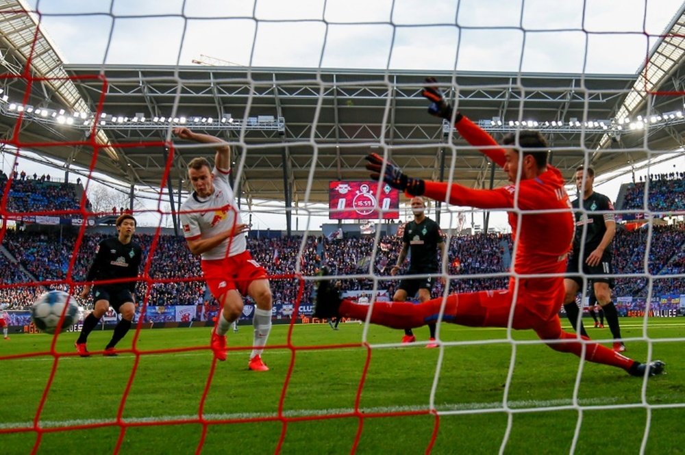 Leipzig warm up for Spurs by regaining top spot in Germany. AFP
