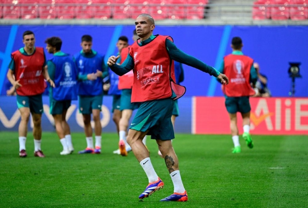Pepe (C) will become the oldest player to play at a European Championship at 41. AFP
