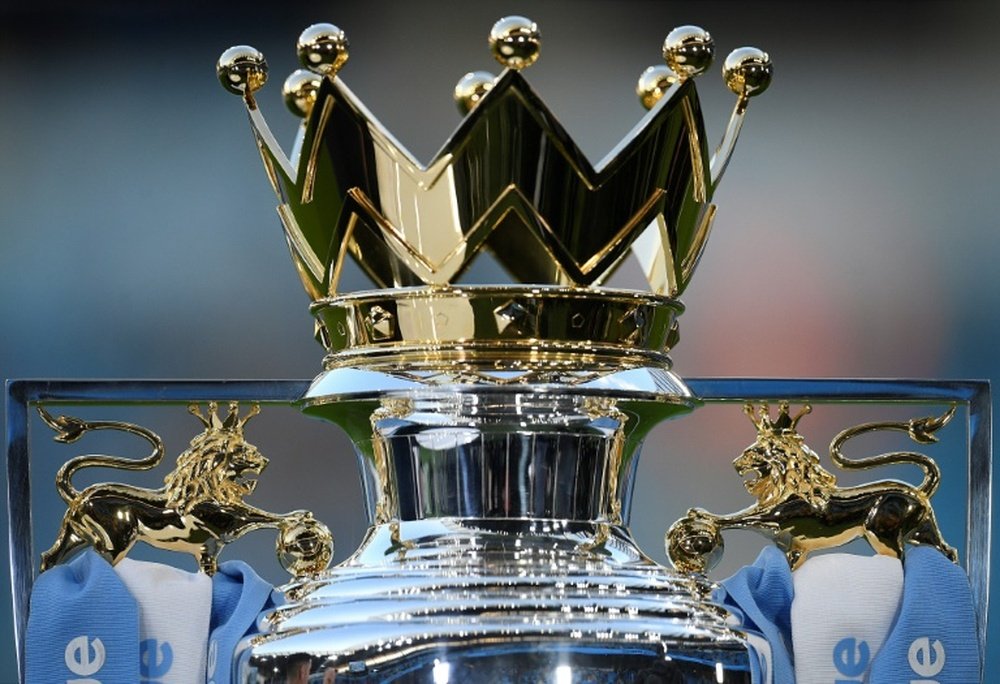 Arsenal, Liverpool and City are locked in a three-way race for the Premier League title. AFP