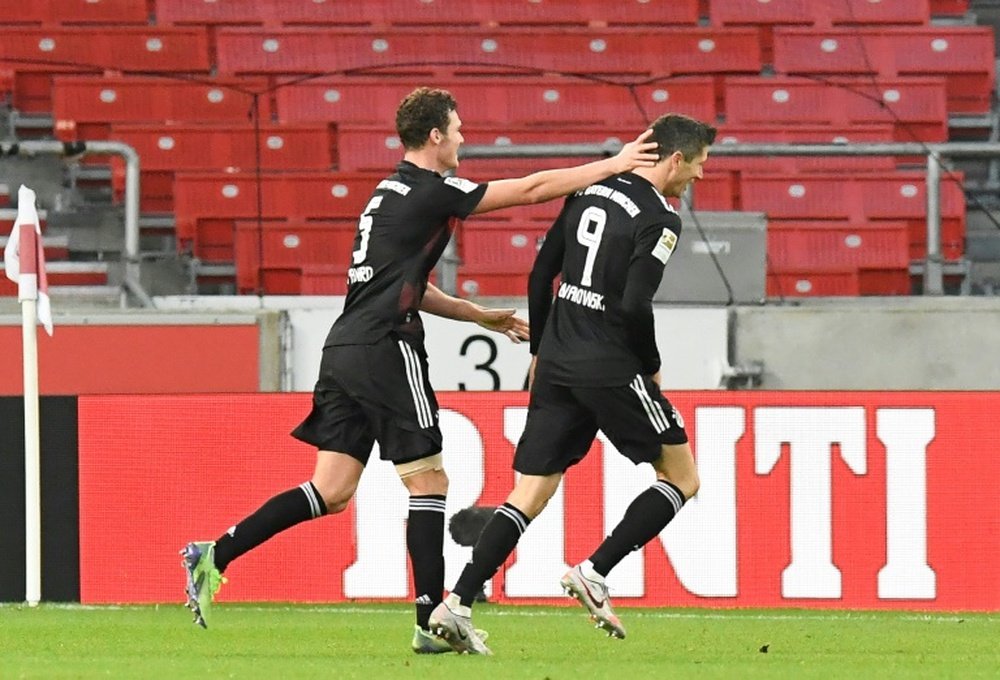 Robert Lewandowski (R) scored as Bayern came from behind to win 1-3. AFP