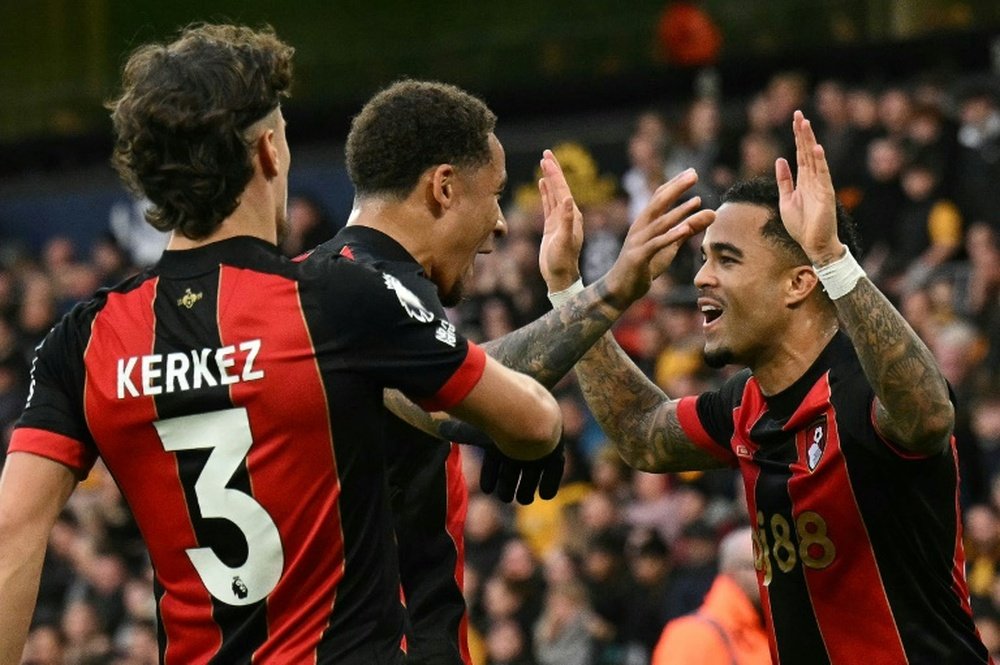 Justin Kluivert scored a hat-trick of penalties for Bournemouth at Wolves. AFP