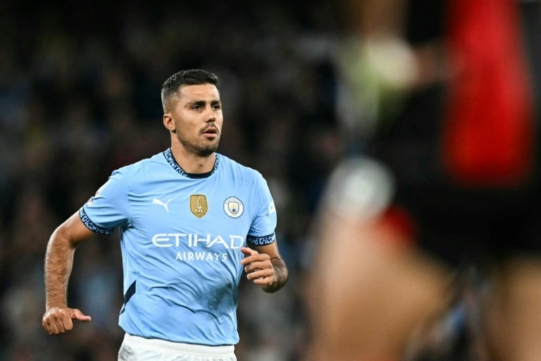Ballon d'Or winner Rodri is back from injury for Manchester City. AFP