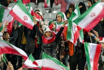 Iran on Thursday allowed female football fans into a stadium for a national team match for the first time in more than a year.