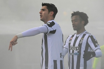 Alvaro Morata and Juan Cuadrado ensured Juventus won at Bologna. AFP
