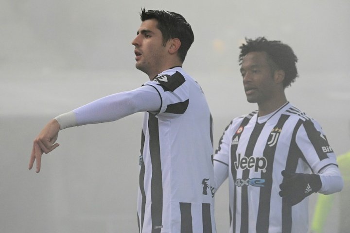Juve battle through fog to win at Bologna, Roma down Atalanta