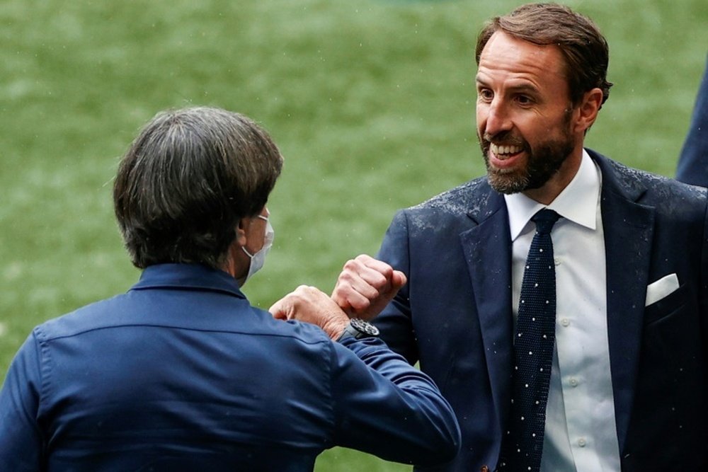 Southgate and Low go head to head in a blockbuster last 16 clash. AFP