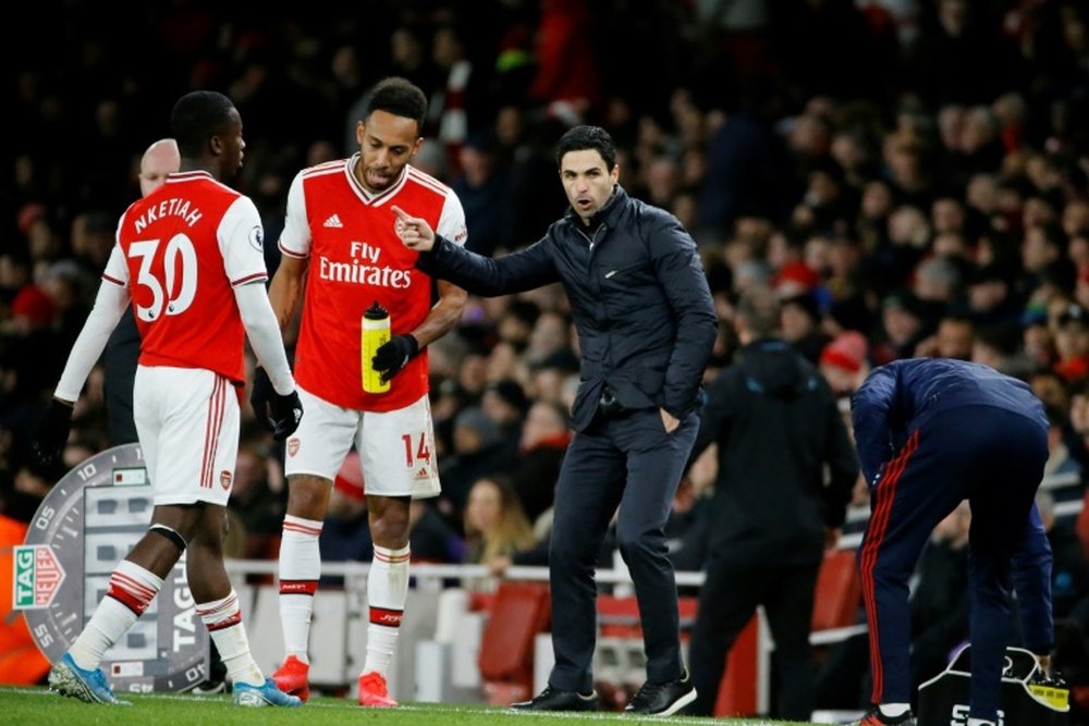 Pierre-Emerick Aubameyang (C) was the hero for Arsenal v Everton. AFP