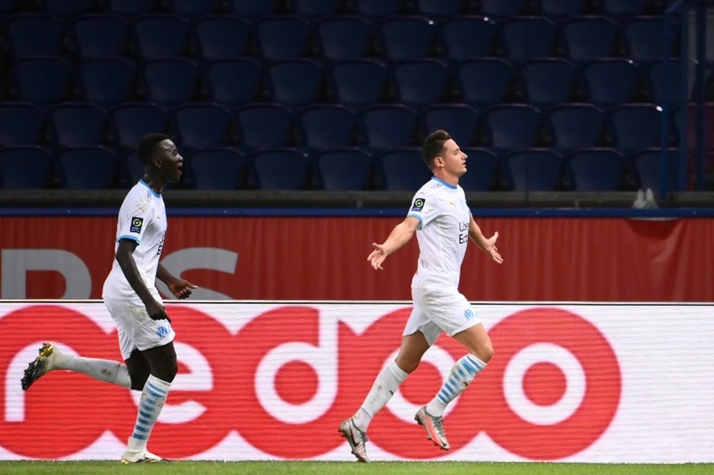 Florian Thauvin (R) gave Marseille victory at PSG. AFP