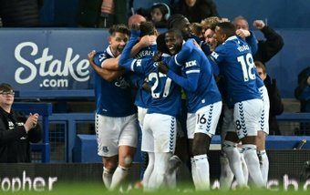 Evertons win in the Merseyside derby left Liverpools Premier League title hopes in tatters. AFP