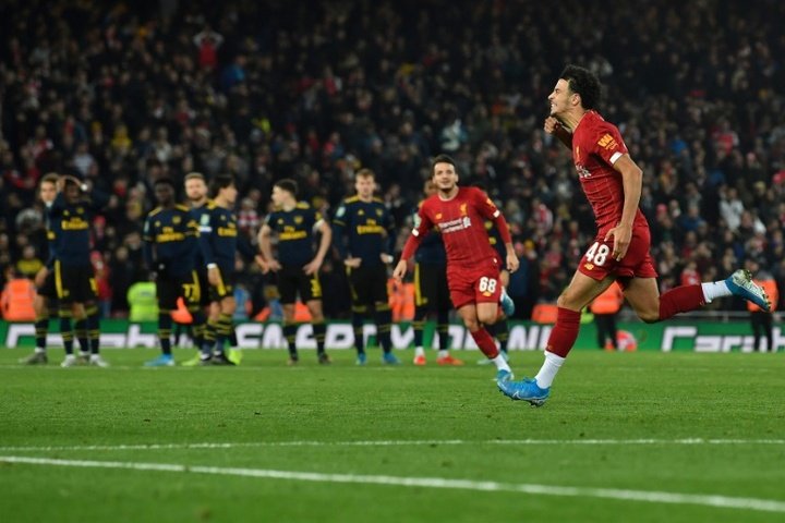 Liverpool reach Carabao quarters after 10-goal thriller against Arsenal