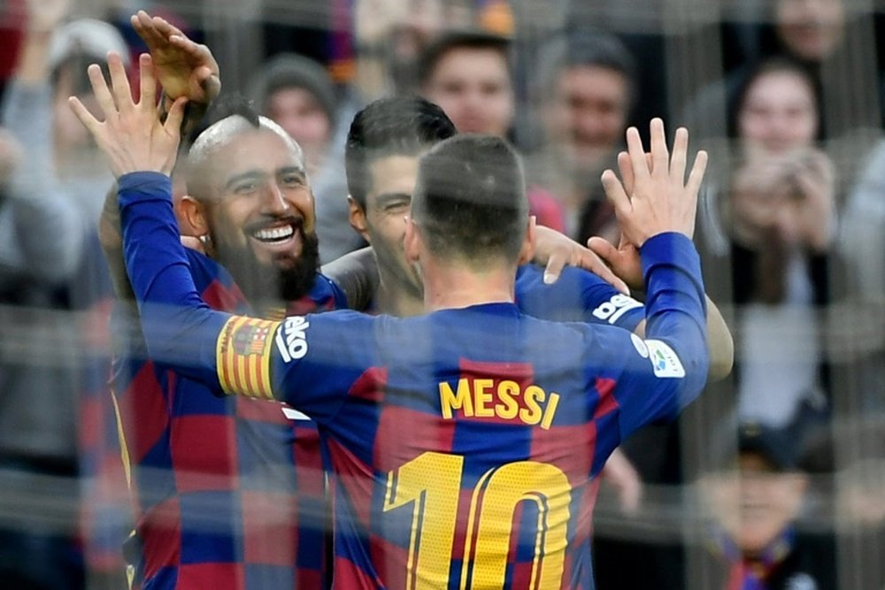 Messi shines in sparkling Barcelona Christmas stroll. AFP