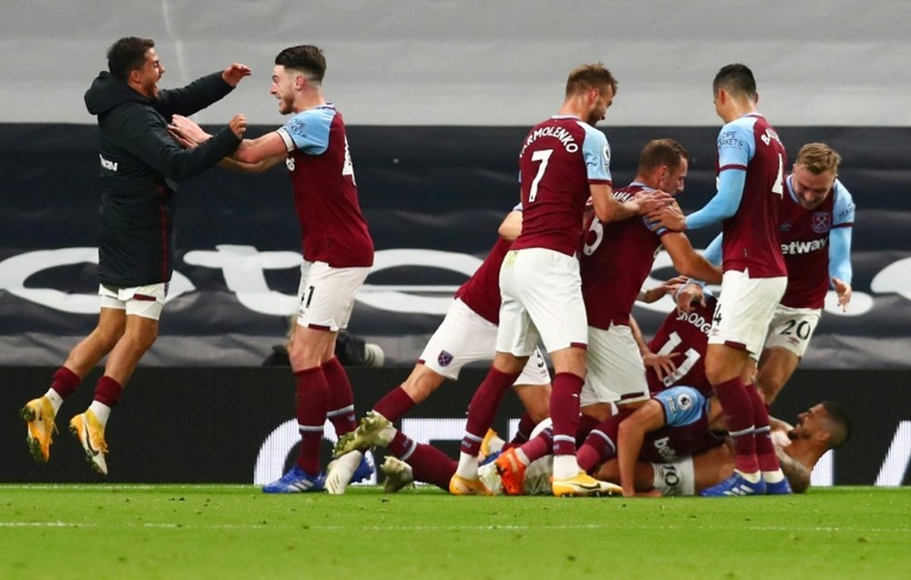 A Manuel Lanzini screamer completed an incredible comeback for West Ham at Spurs. AFP
