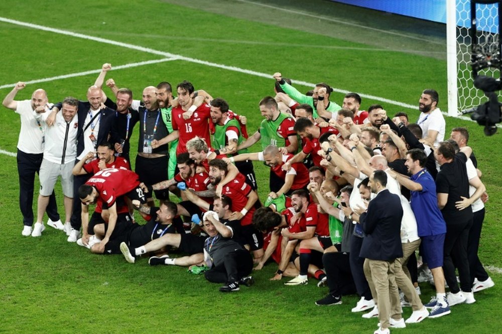 Georgia recorded their first ever victory at the tournament to reach the last 16. AFP