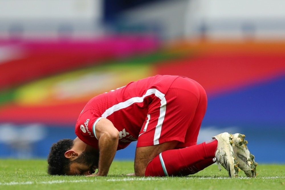 Egyptian Mohamed Salah celebrates his 100th Liverpool goal. AFP