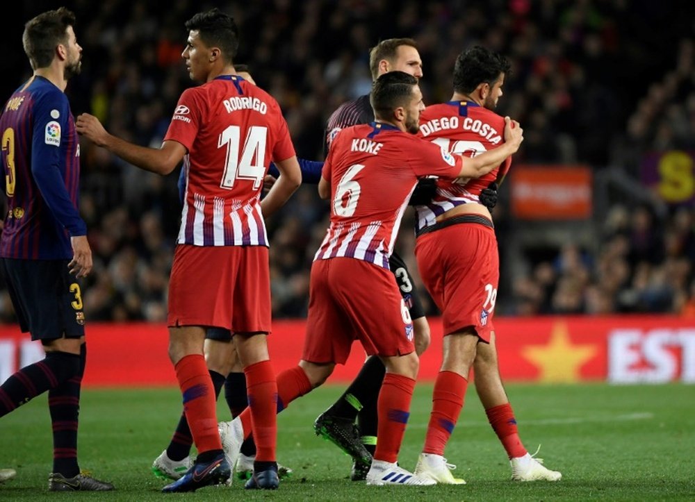 Diego Costa was sent off for Atletico. AFP