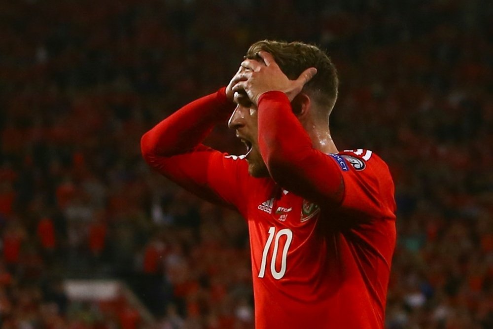 Ramsey will not make appearance in the China Cup. AFP