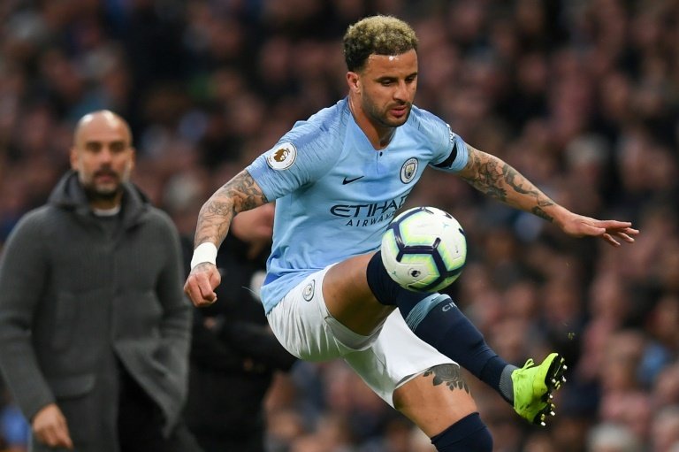 Kyle Walker (r) will be a Man City player until 2024. AFP