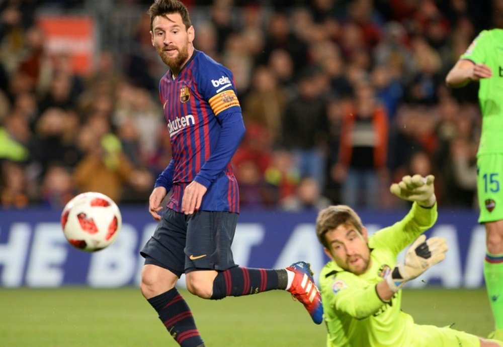Lionel Messi scoring in Barcelonas Copa del Rey win over Levante on Thursday. AFP