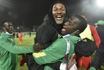 Rigobert Song  celebrates after Cameroon qualified for the 2022 World Cup by defeating Algeria. AFP