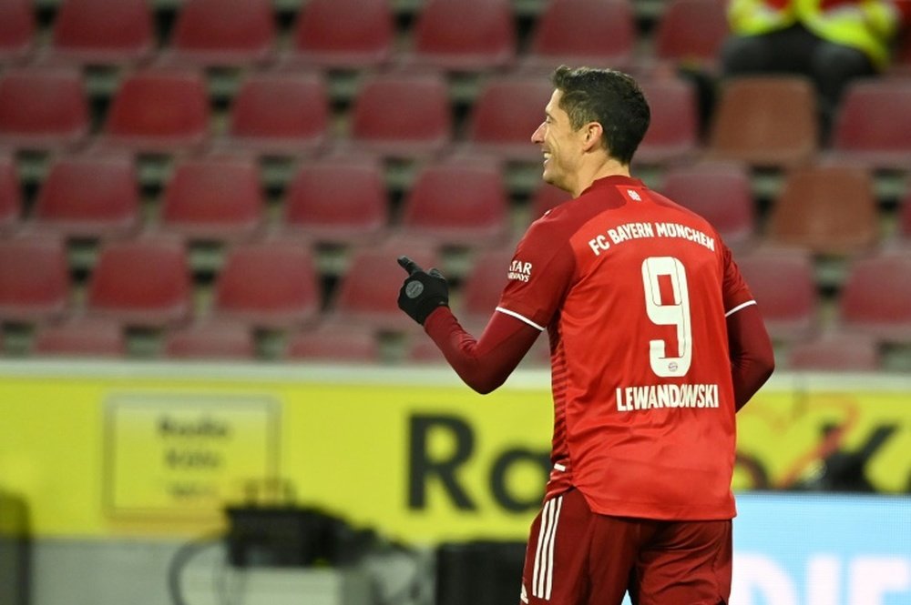 Robert Lewandowski netted a hat-trick as Bayern won 0-4 at Cologne. AFP
