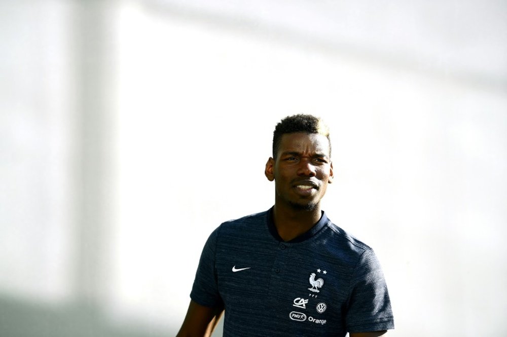 Pogba says the armband does not affect him. AFP