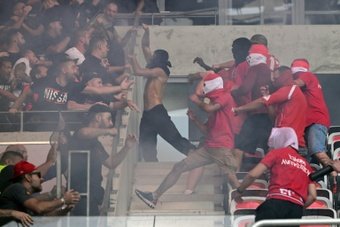 One fan 'critical' after clashes at Nice v Cologne Conference League tie. AFP