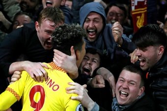 Liverpool beat Arsenal to enhance title bid, report breaker Kane lifts Spurs