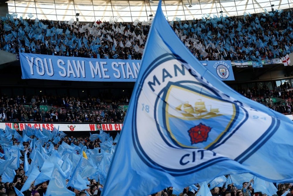 Manchester City could face a two-window transfer ban. AFP