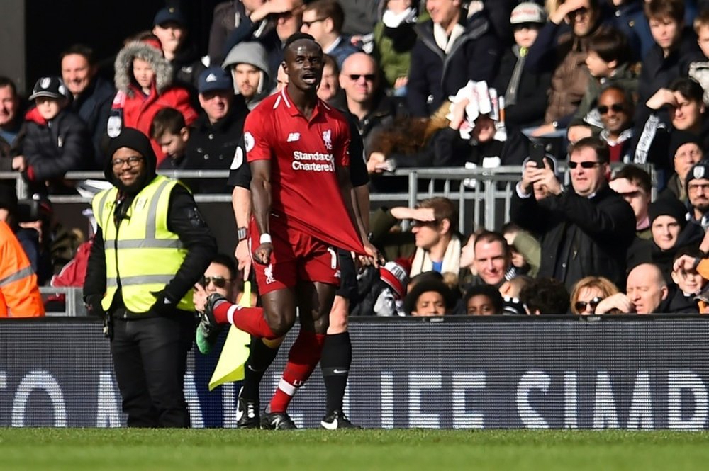 Mane celebrates yet another goal for Liverpool. AFP