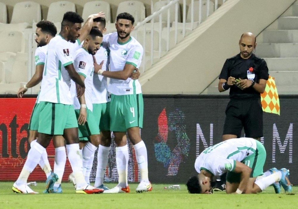 On target: Saudi Arabias players celebrate their opening goal. AFP