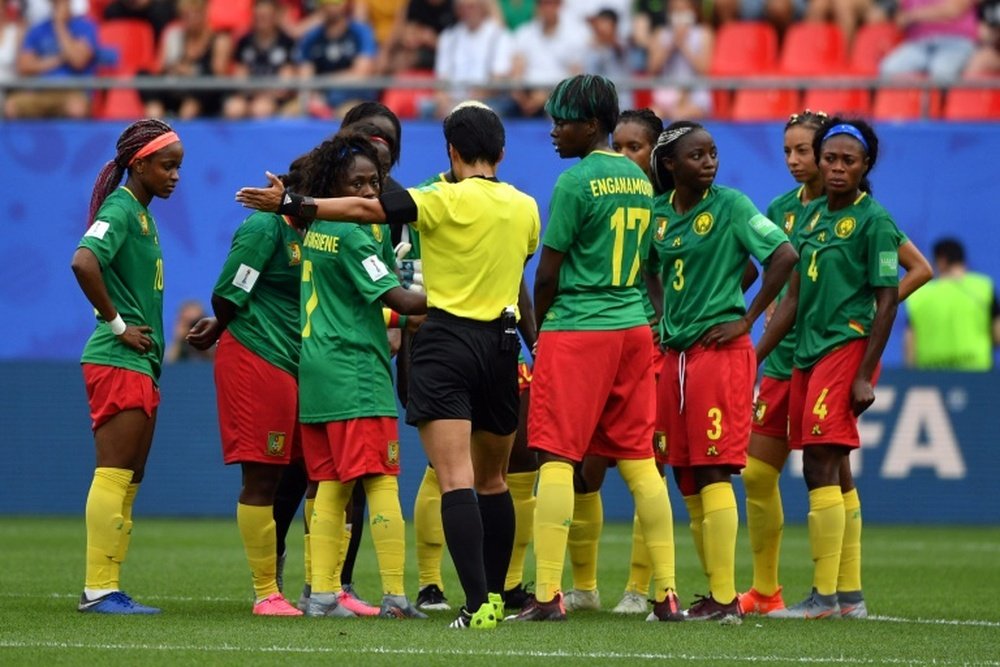 England coach Neville slams Cameroon after heated World Cup clash. AFP