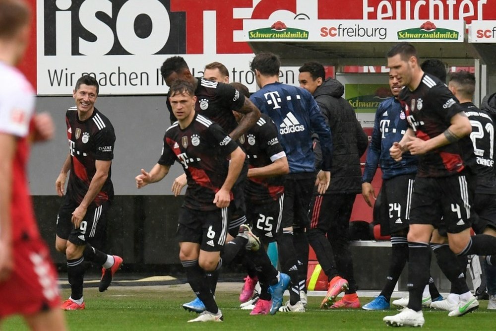 Lewandowski's record-breaking goal was met by celebrations from th eentire squad. AFP