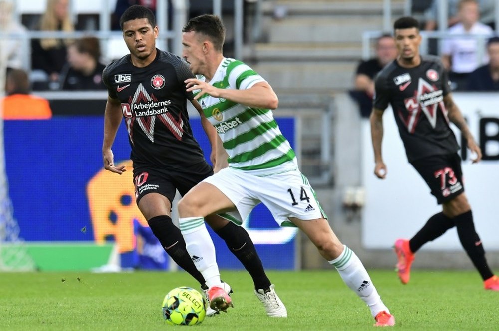 David Turnbull (C) scored a hat-trick as Celtic demolished St Mirren. AFP