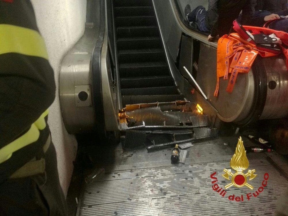 Wreckage of an escalator after it jammed at the metro station Repubblica in Rome. AFP