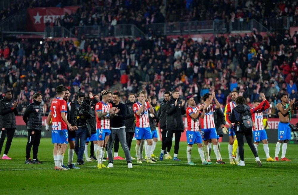 Girona find themselves level on 48 points with leaders Real Madrid. AFP