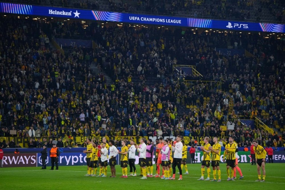 Borussia Dortmund players thanked the crowd after their 3-1 win over Barcelona. AFP