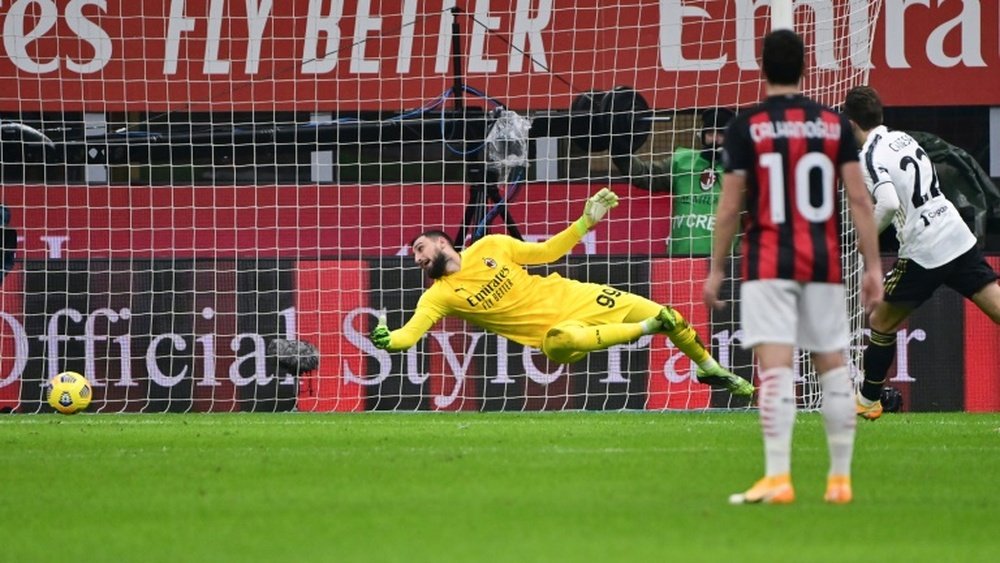 Chiesa (R) scored twice as Juventus beat AC Milan 1-3 on Wednesday. AFP