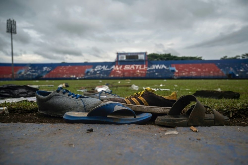 Indonesia probes elite officers as stadium disaster death toll rises. AFP