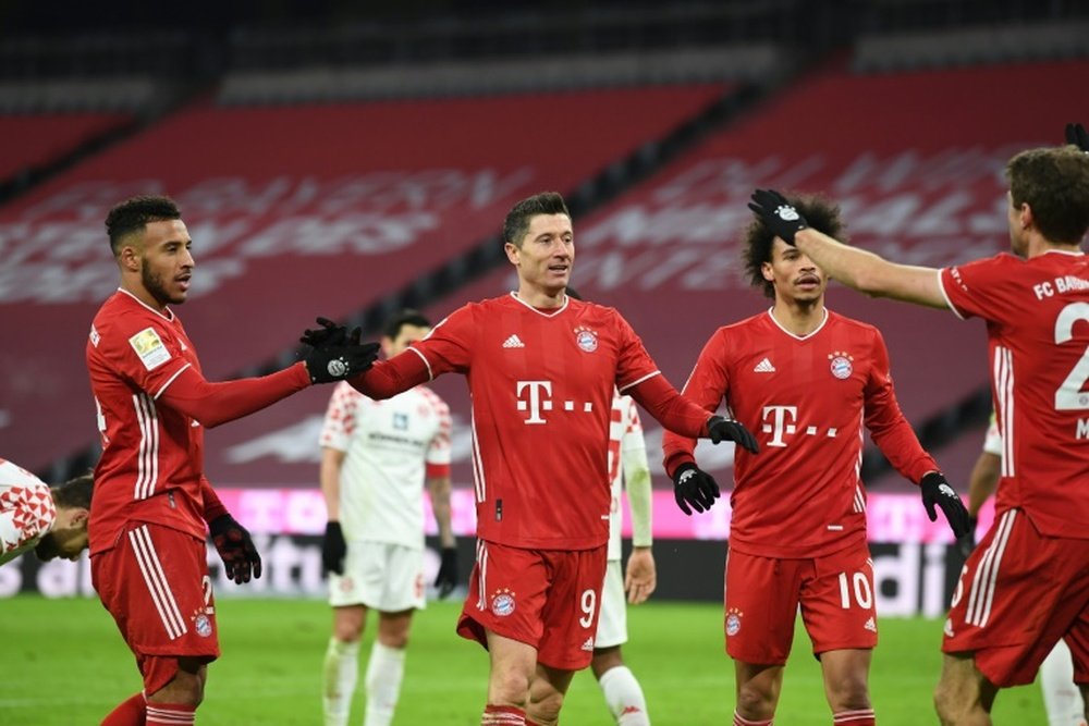 Lewandowski nets twice as Bayern roar back to floor Mainz. AFP