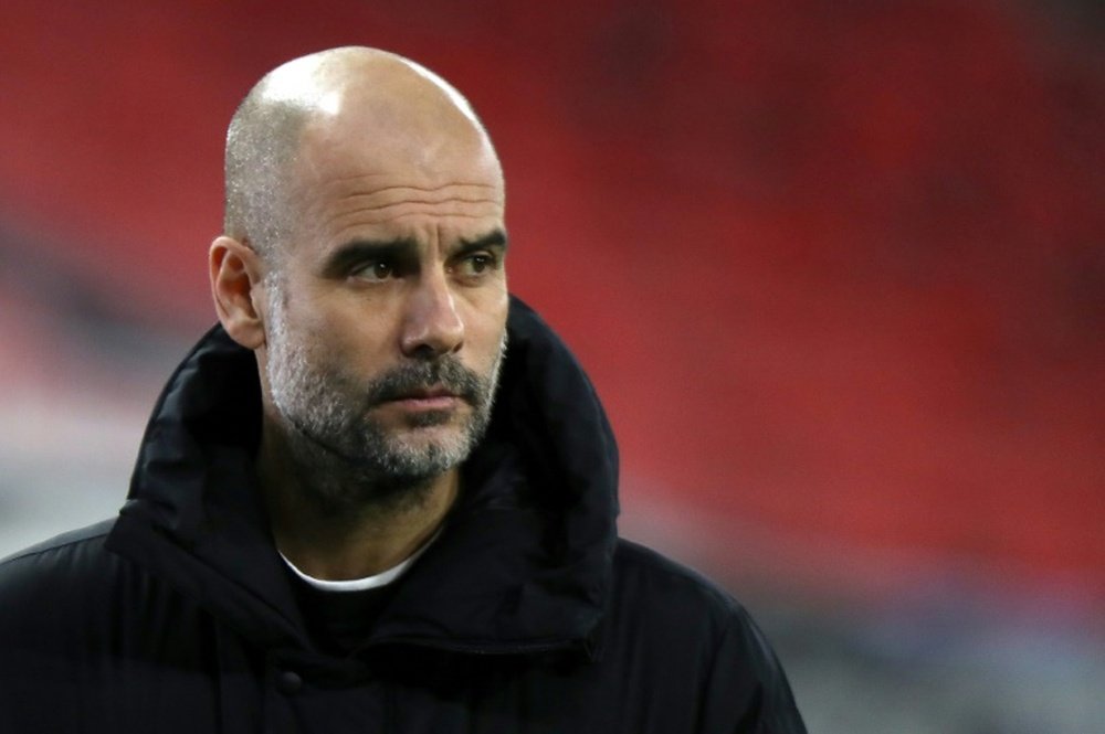 Guardiola admits pressure to win Champions League at City. AFP