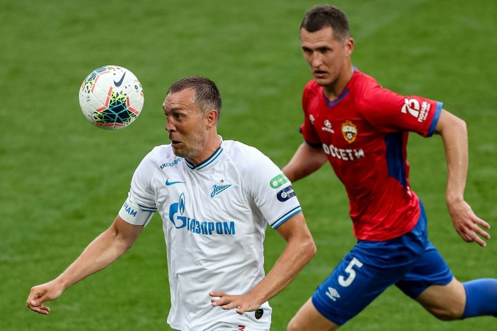 Artem Dzyuba (L) got two in Zenit's 2-4 win at Krasnodar. AFP