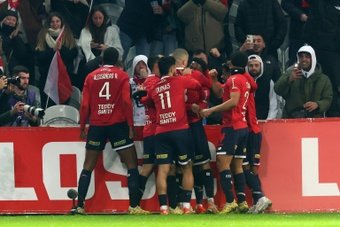 Jonathan David grabbed a dramatic stoppage-time equaliser for Lille in a 1-1 draw with Ligue 1 leaders Paris Saint-Germain on Sunday, cancelling out Kylian Mbappe's spot-kick.