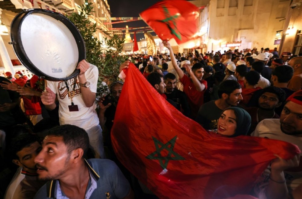 Morocco fans celebrated in a Doha street market. AFP