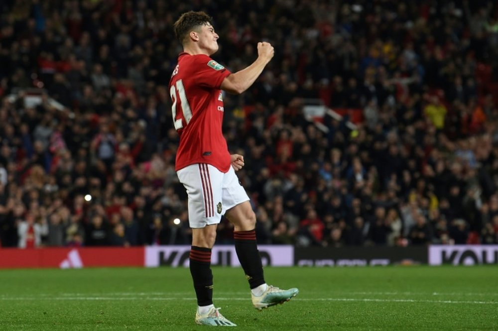 Daniel James scored the winning penalty to spare United's blushes v Rochdale. AFP