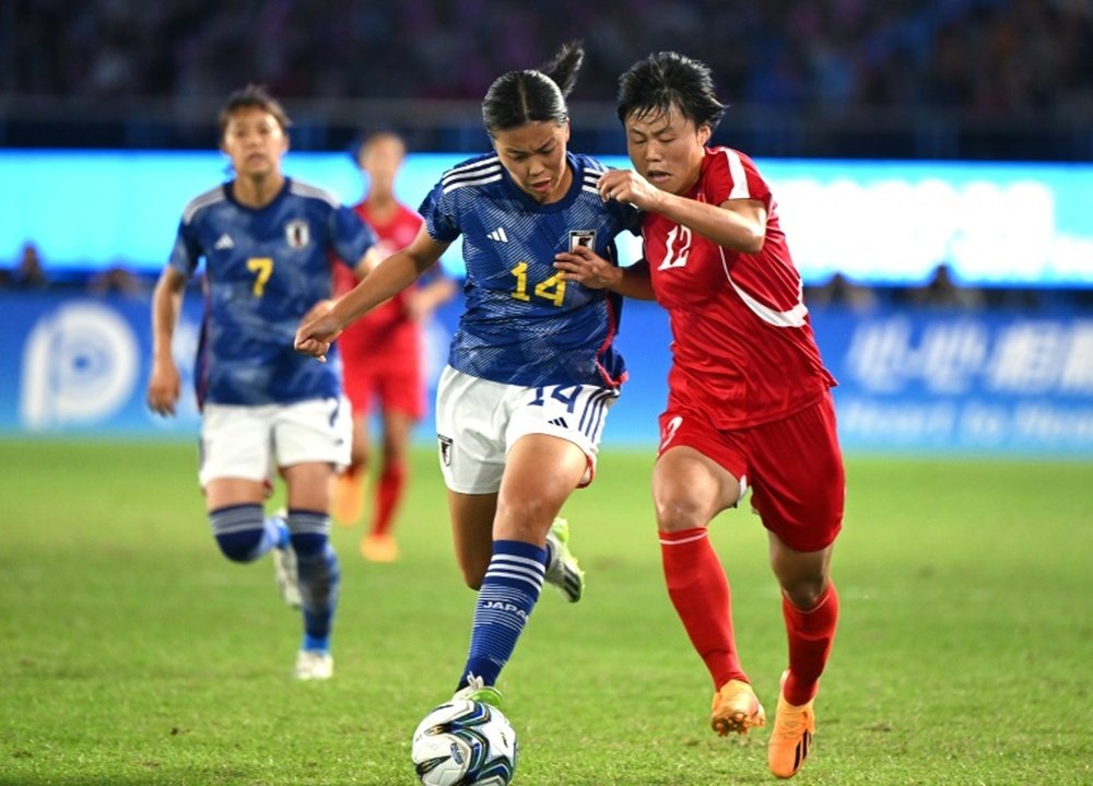 Japan scored three goals in the space of six second-half minutes to put the result beyond doubt. AFP