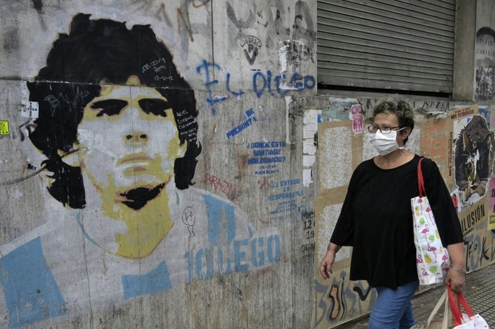 Maradona pleads for 'Hand of God' to end pandemic. AFP
