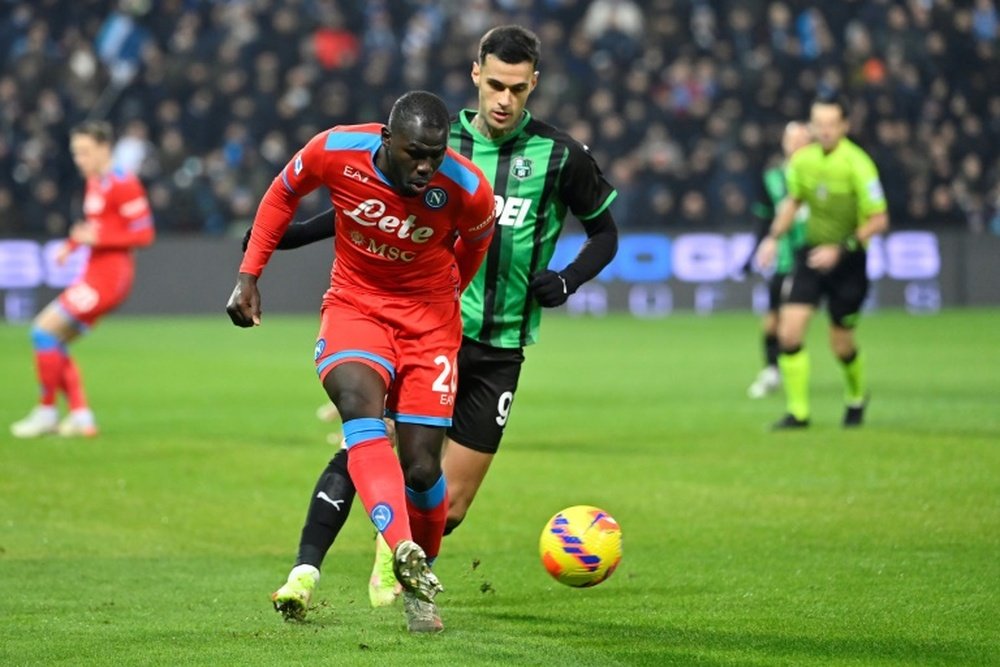 Kalidou Koulibaly (L) tore his hamstring in Napoli's draw at Sassuolo. AFP